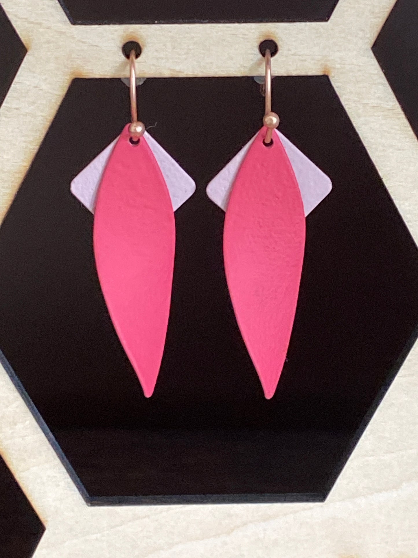 Blaadjes met roze vierkantjes