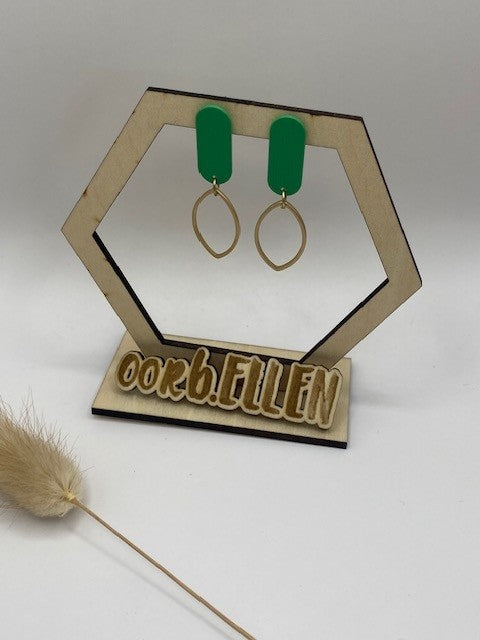 Gouden ellips onder groen kokertje