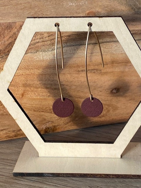 donkere porto schijfje aan gouden bogen