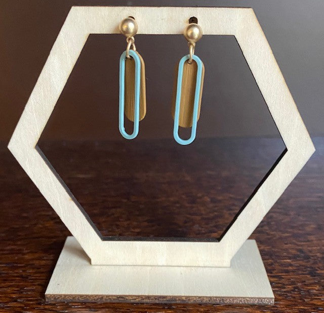 ellipsen zeegroen en chocoladebruin aan gouden knopje