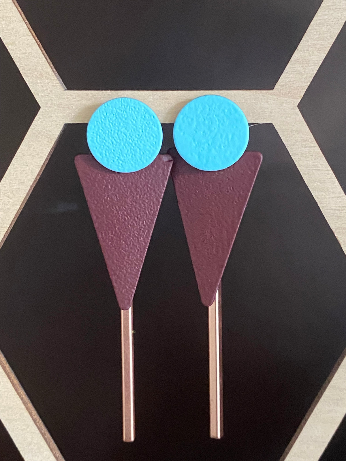 Lichtblauwe knopjes met aubergine en rosé