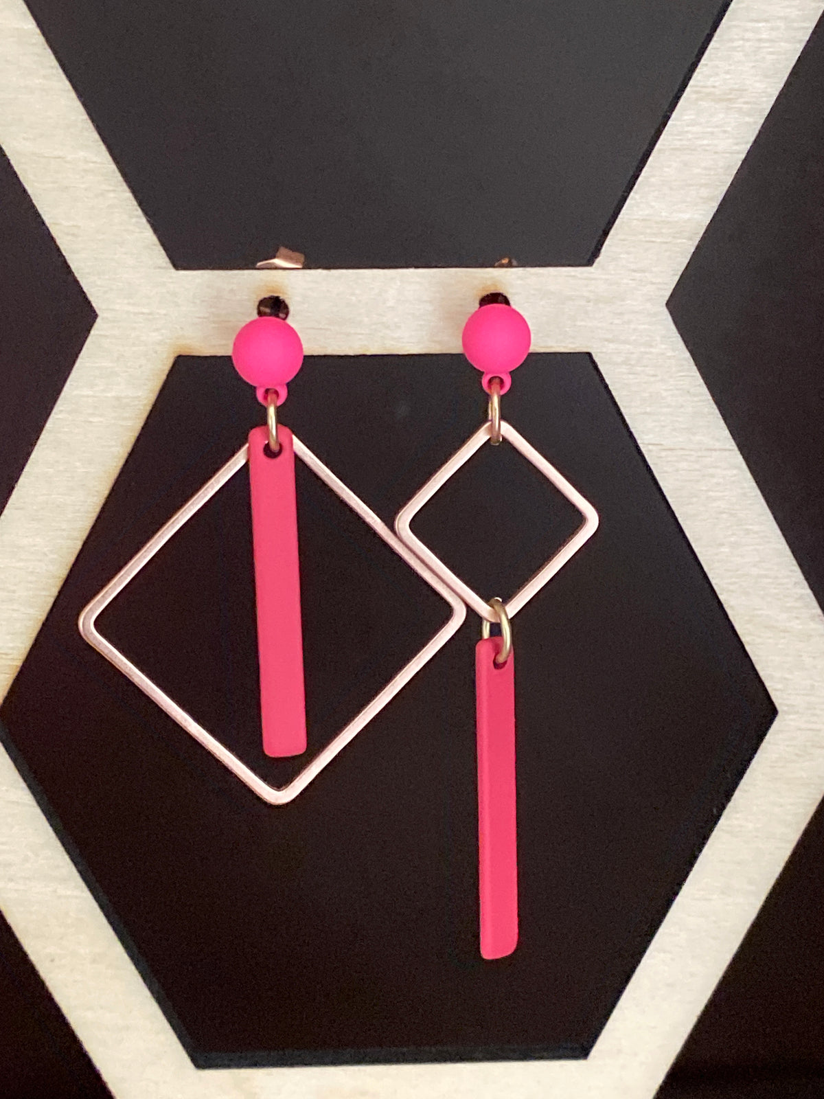Vierkant staafjes roze-goud asymmetrisch