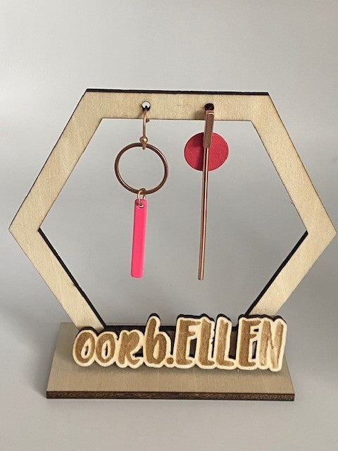 asymmetrisch paartje staafjes cirkels roze rosé