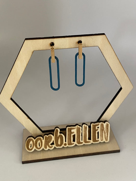 blauwe paperclip aan gouden staafje